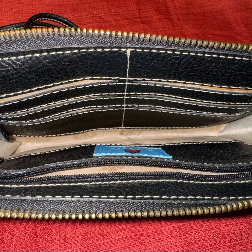 Kathy Van Zeeland Crossbody handbag with safety clasps and wristlet strap, EUC